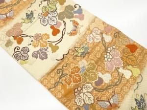 唐織瓢箪に蝶・花菱七宝・紗綾形模様織出し袋帯